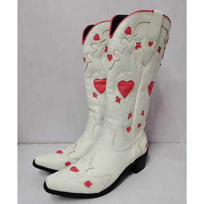 Stylish white cowgirl boots with pink hearts, perfect for adding flair to outfits