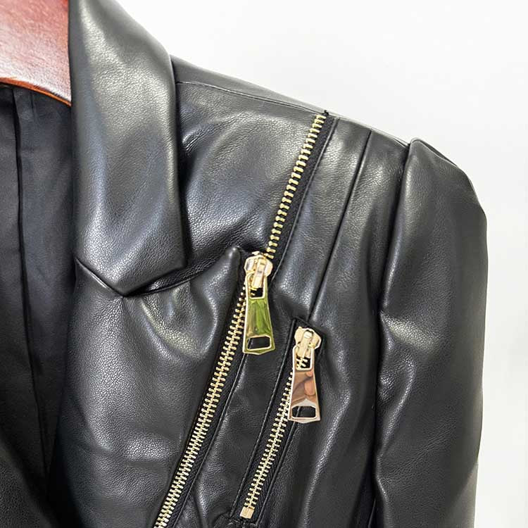 Close-up of a black fitted leather jacket with zippers showcasing stylish details and quality craftsmanship