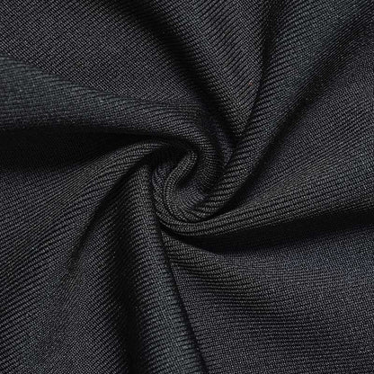 Close-up of luxurious fabric for a black halter neck rhinestone dress showcasing its texture