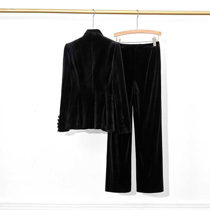 Elegant black velvet pantsuit for women featuring a tailored blazer and wide-leg pants