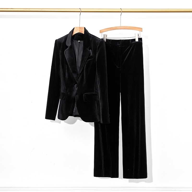 Elegant black velvet pantsuit for women featuring a tailored blazer and matching trousers