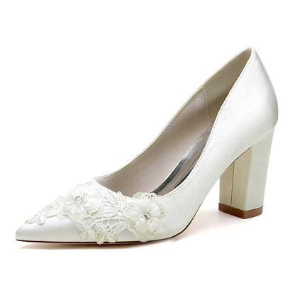 Elegant block heel bridal shoes with flower appliqué, perfect for weddings and formal occasions