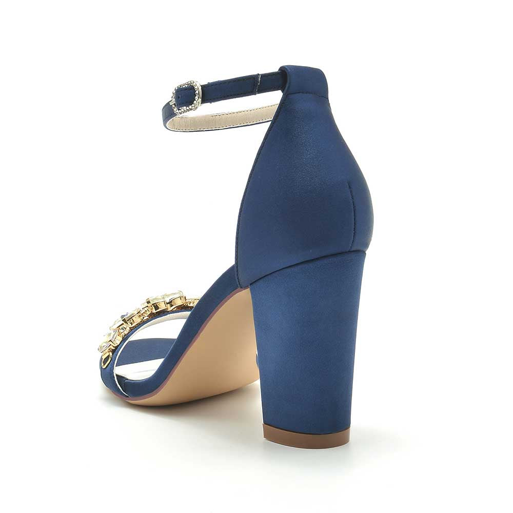 Navy blue block heel wedding sandals for brides with an elegant ankle strap and embellishments