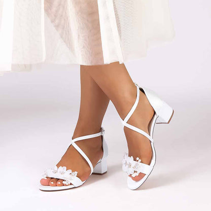 Elegant block heel wedding sandals with floral embellishments for stylish bridal footwear