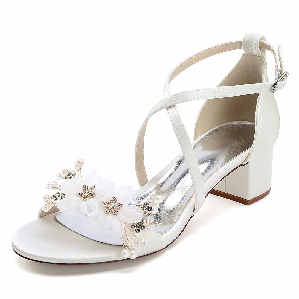 Elegant block heel wedding sandals with floral embellishments and adjustable ankle strap 