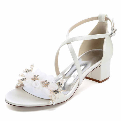 Elegant block heel wedding sandals with floral embellishments and adjustable ankle strap 