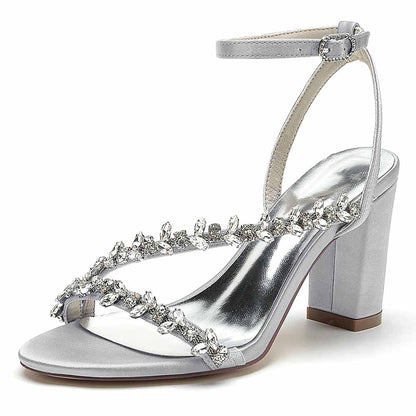 S&DCo. Block heels sandals in silver with rhinestone embellishments and adjustable ankle strap