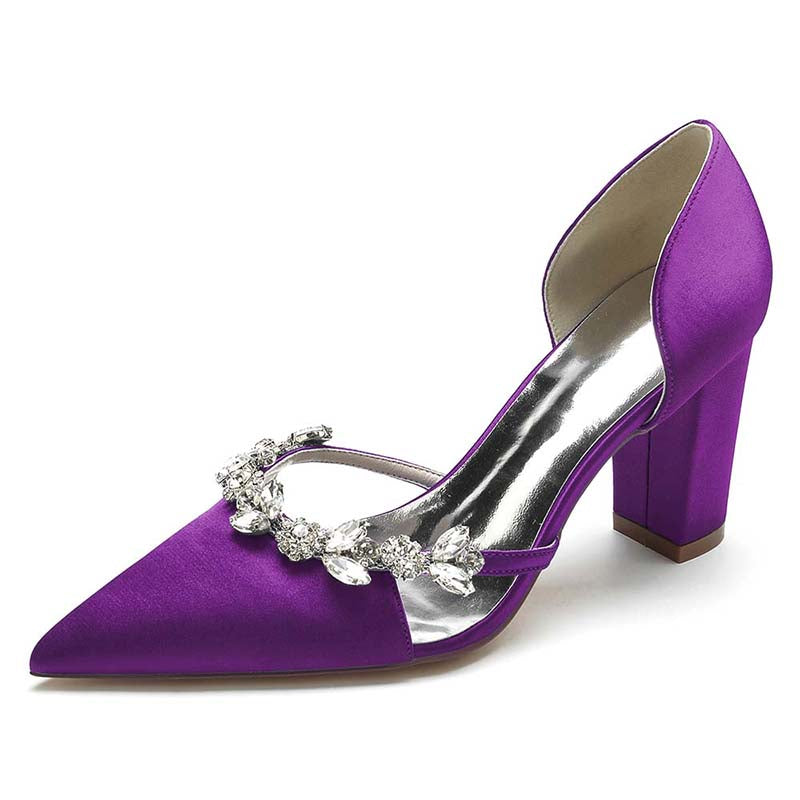 Purple high-heeled shoe with silver embellishments on a white background