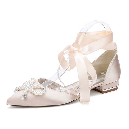Elegant bridal ankle strap flat shoes with pearl embellishments and satin ribbon in soft beige