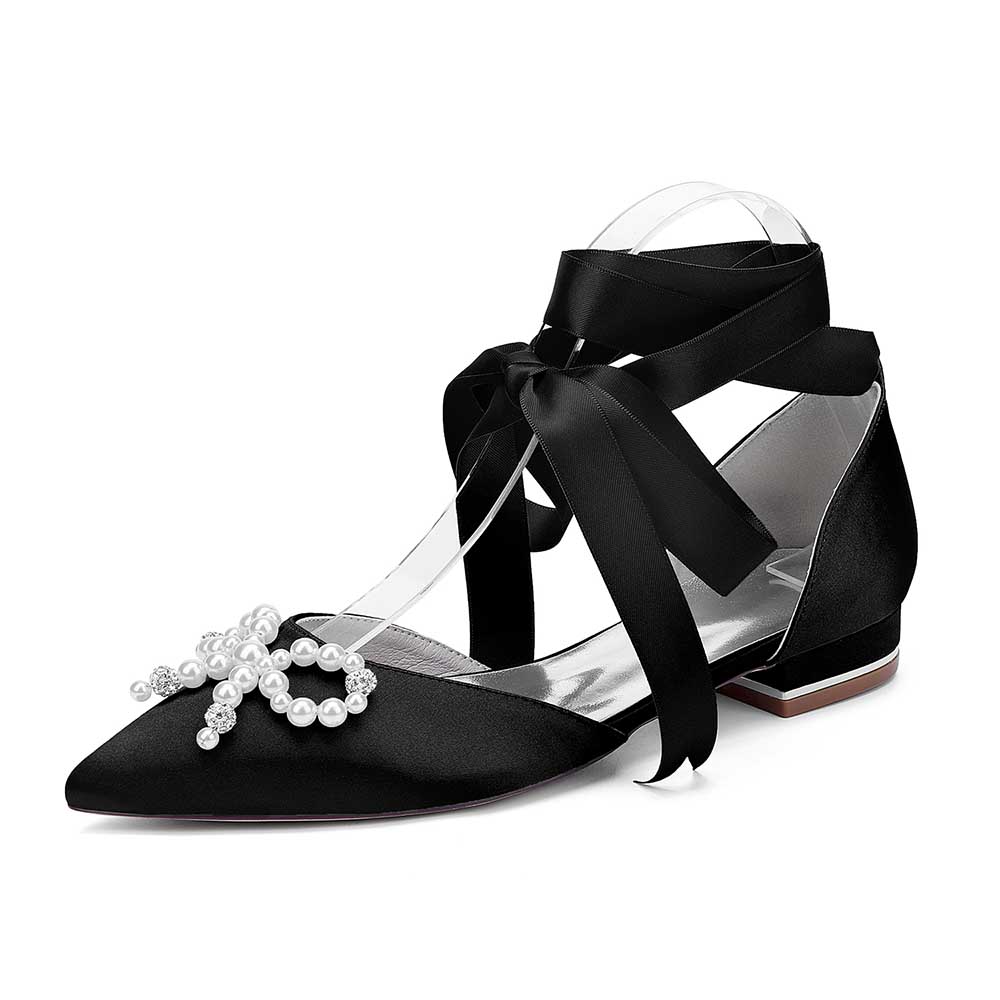 Elegant bridal ankle strap flat shoes in black satin with pearl embellishments and ribbon ties