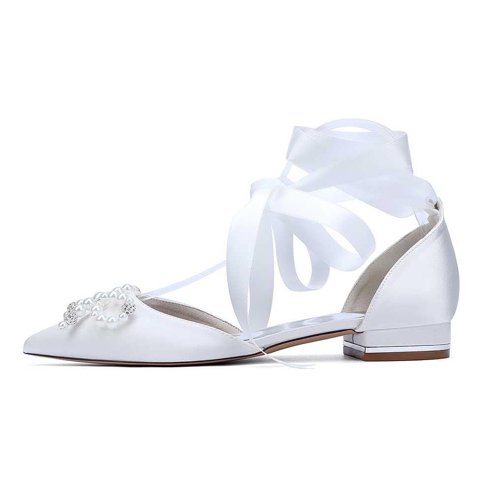 Elegant bridal ankle strap flat shoes with ribbon ties and pearl embellishments in white