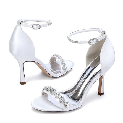 Elegant S&DCo. bridal ankle strap heels in white with sparkling embellishments for special occasions