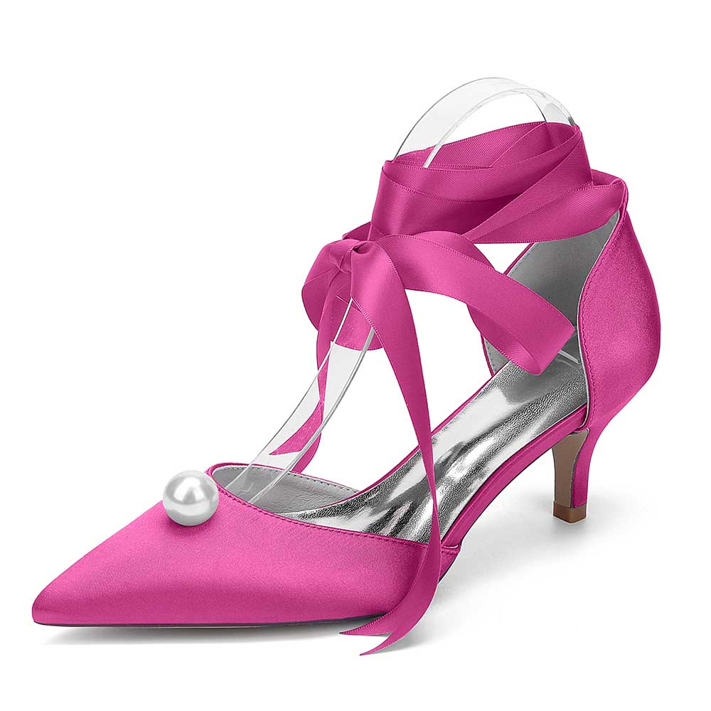 Pink bridal ankle strap heels with pearls featuring elegant satin finish and ribbon ties