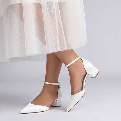 Elegant bridal ankle strap wedding shoes in white with a chic pointed toe design