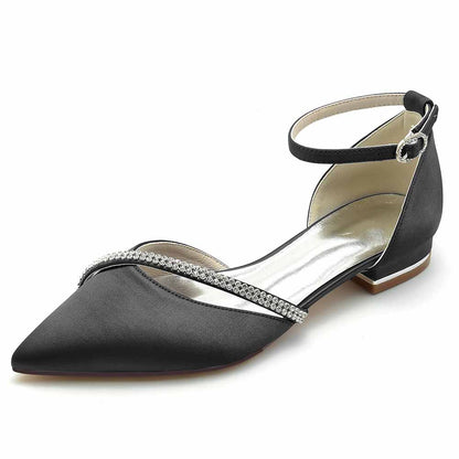 Elegant pointed toe satin bridal flats in black with a chic ankle strap and rhinestone detailing
