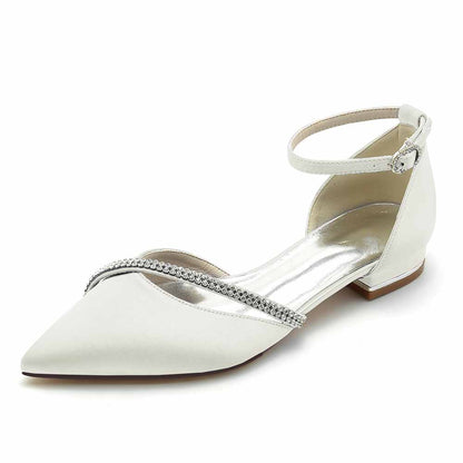 Elegant pointed toe satin bridal flats with a delicate strap and rhinestone detailing