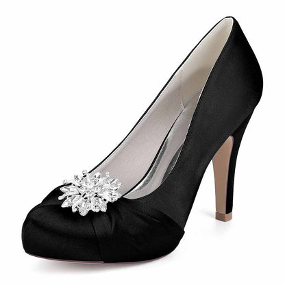 Elegant black satin crystal embellished bridal heels with a sparkling floral brooch detail