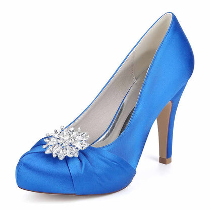 S&DCo. crystal embellished bridal heels in blue satin with a decorative gem embellishment