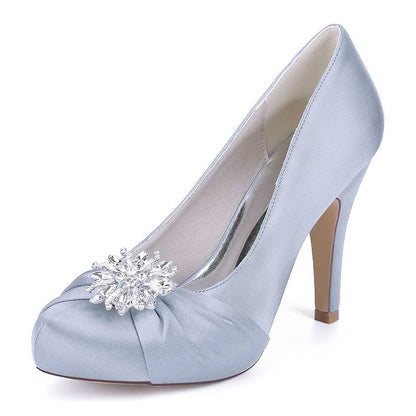 Elegant light blue S&DCo. crystal embellished bridal heels with a decorative floral brooch