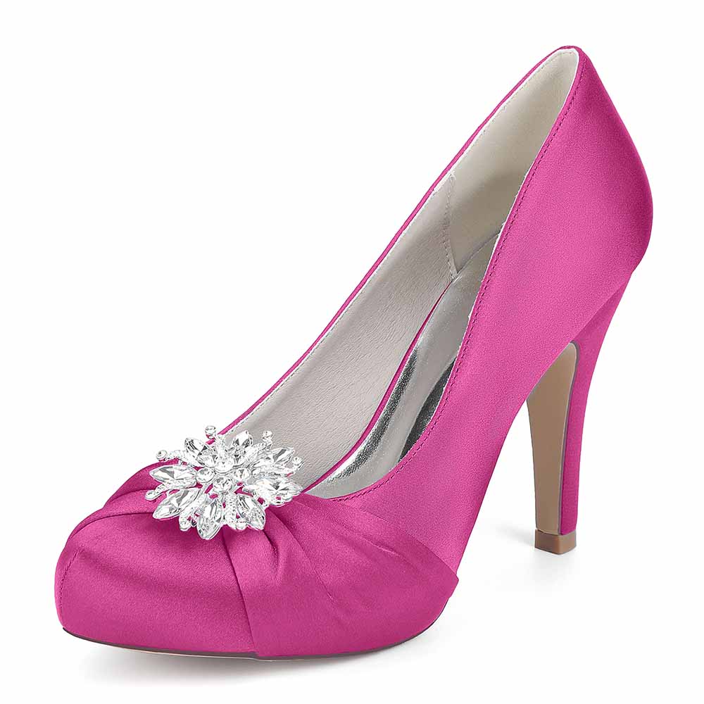 S&DCo. pink satin crystal embellished bridal heels featuring a decorative gem on the toe