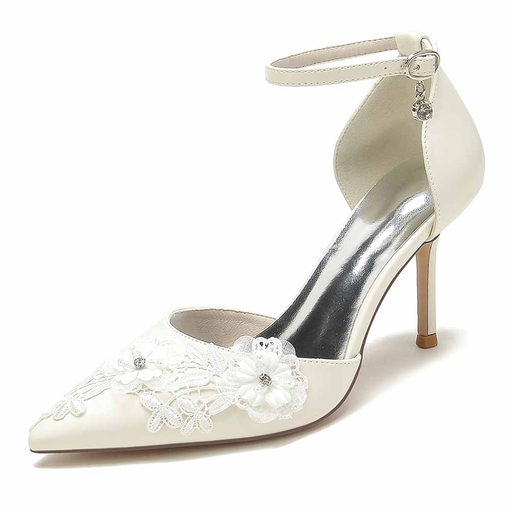 Elegant bridal heels with ankle strap featuring floral lace details and a pointed toe design