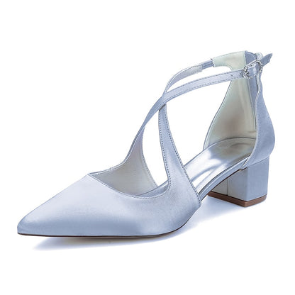Light blue bridal heels with crossing straps and block heels for elegant weddings