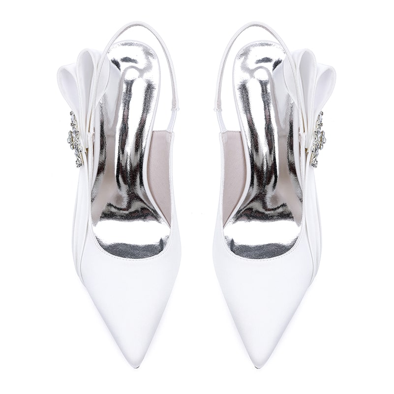 Elegant bridal heels with rhinestone embellishment featuring a sleek white design and pointed toe