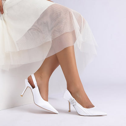 Elegant bridal heels with rhinestone embellishment and a chic slingback design for wedding attire