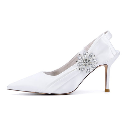 Elegant white bridal heels with rhinestone embellishment for a stylish wedding look