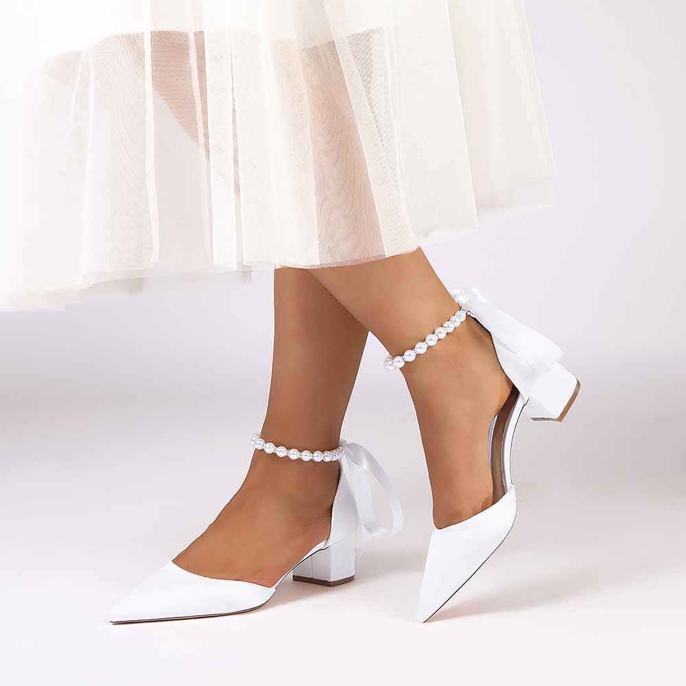 Elegant lace-up dress sandals for brides with white pointed toe and pearl ankle straps