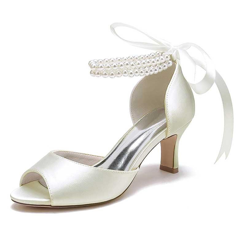 Elegant low heel satin bridal shoes with pearl ankle strap and bow detail for weddings