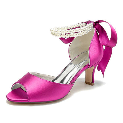 S&DCo. low heel satin bridal shoes in pink with pearl and ribbon accents for elegant weddings