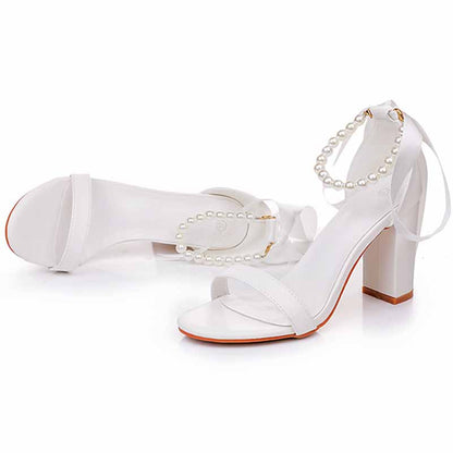 Bridal pearl ankle strap chunky heels in white with elegant pearl detailing