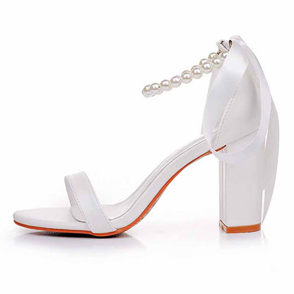 Bridal pearl ankle strap chunky heels in white with a fashionable design for weddings
