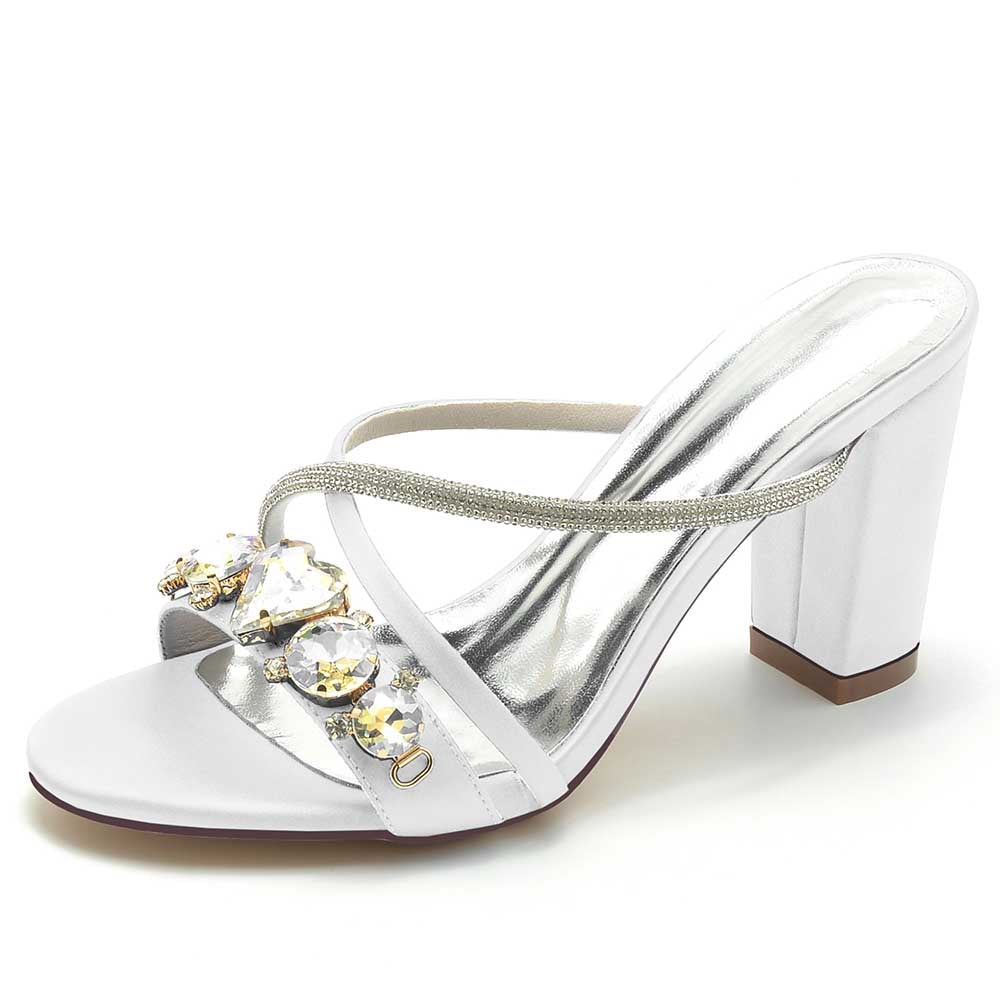 White rhinestone bridal block heel sandals with sparkling embellishments for wedding attire