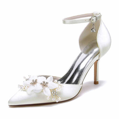 Elegant S&DCo. bridal satin ankle strap pumps with floral embellishments and pointed toe design