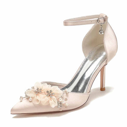 Elegant S&DCo. bridal satin ankle strap pumps with floral embellishments and a pointed toe