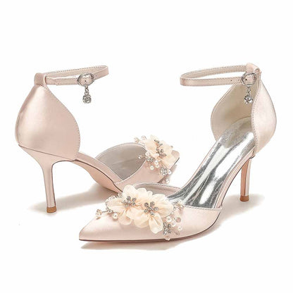 S&DCo. bridal satin ankle strap pumps with floral embellishments and a pointed toe design