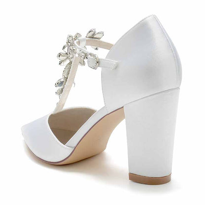 Elegant S&DCo. bridal satin chunky heel pumps with decorative rhinestone embellishments