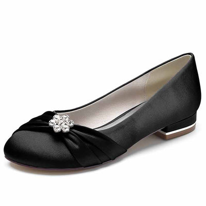 Elegant black bridal satin flats for wedding with a sparkling floral embellishment