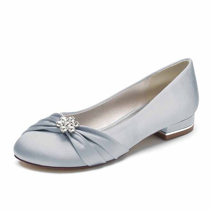 Elegant bridal satin flats for wedding featuring a twist design and rhinestone embellishment