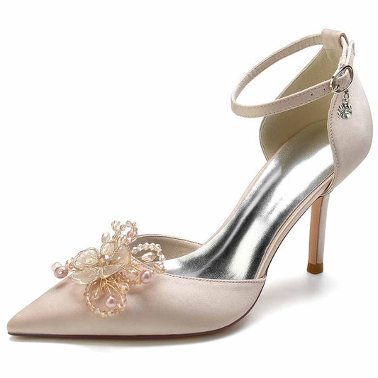 Elegant bridal satin point toe heels with floral embellishments and ankle strap for a stylish look