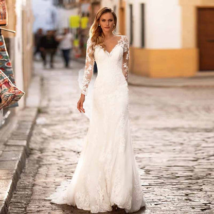 Trumpet/Mermaid V-neck Chapel Train Tulle Wedding Dresses With Appliques Lace