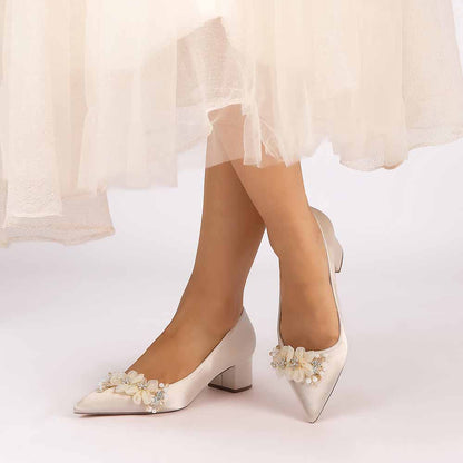 Elegant heels for brides featuring flower appliques for a stylish wedding look