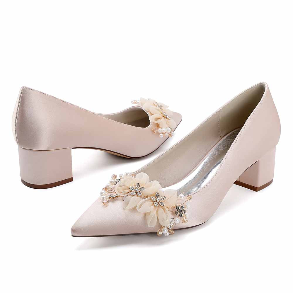 Elegant bridal heels with flower appliques designed for brides on their special day