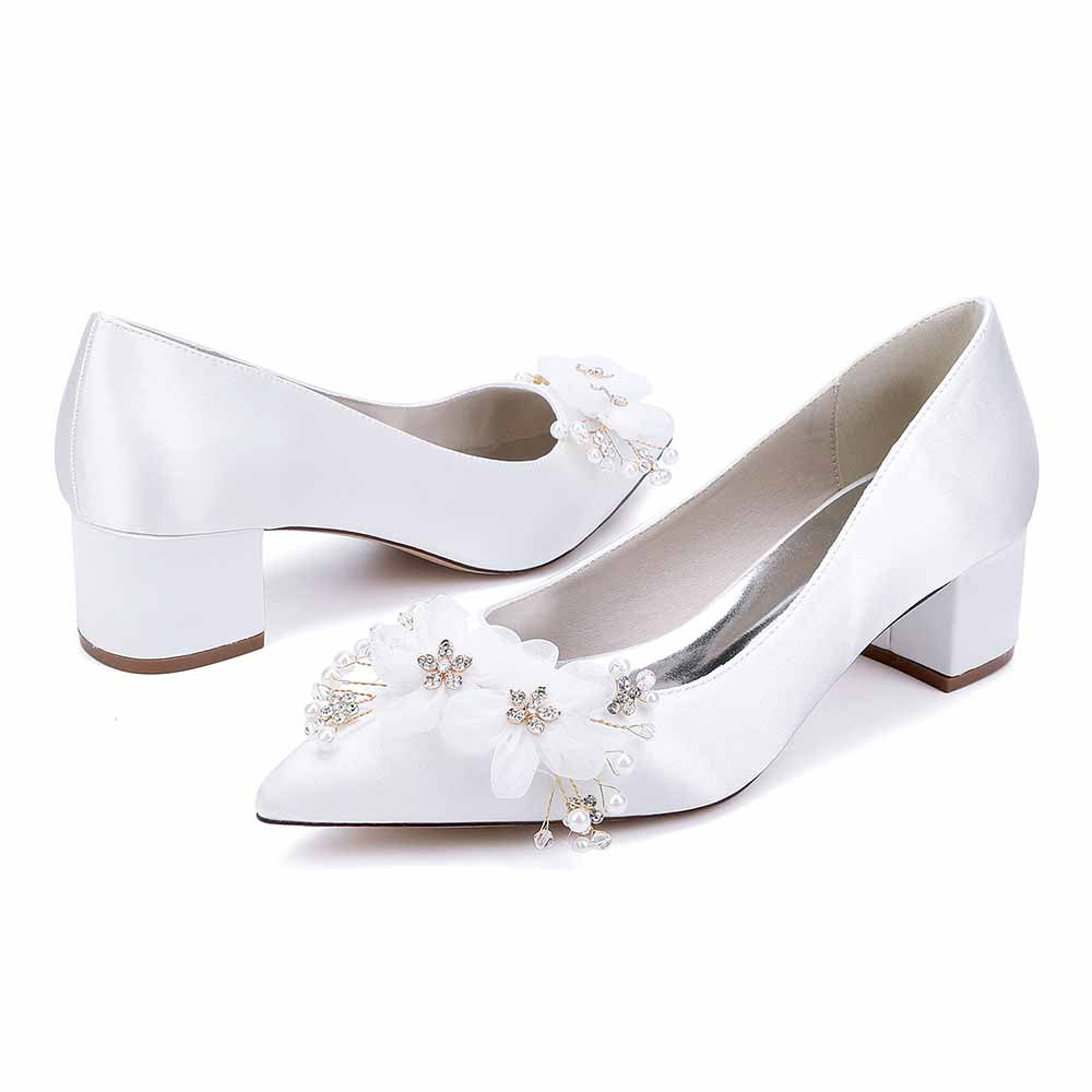 Elegant white bride shoes with flower appliques and block heels for wedding occasion