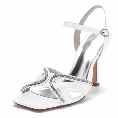 Elegant white sequined satin bridesmaid sandals with a stylish ankle strap and a decorative design