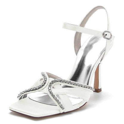 Elegant white sequined satin bridesmaid sandals with a sleek heel and stylish ankle strap