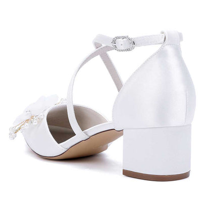 Elegant white heels by sd-hk, perfect bridesmaid shoes with flower detail and a comfortable block heel