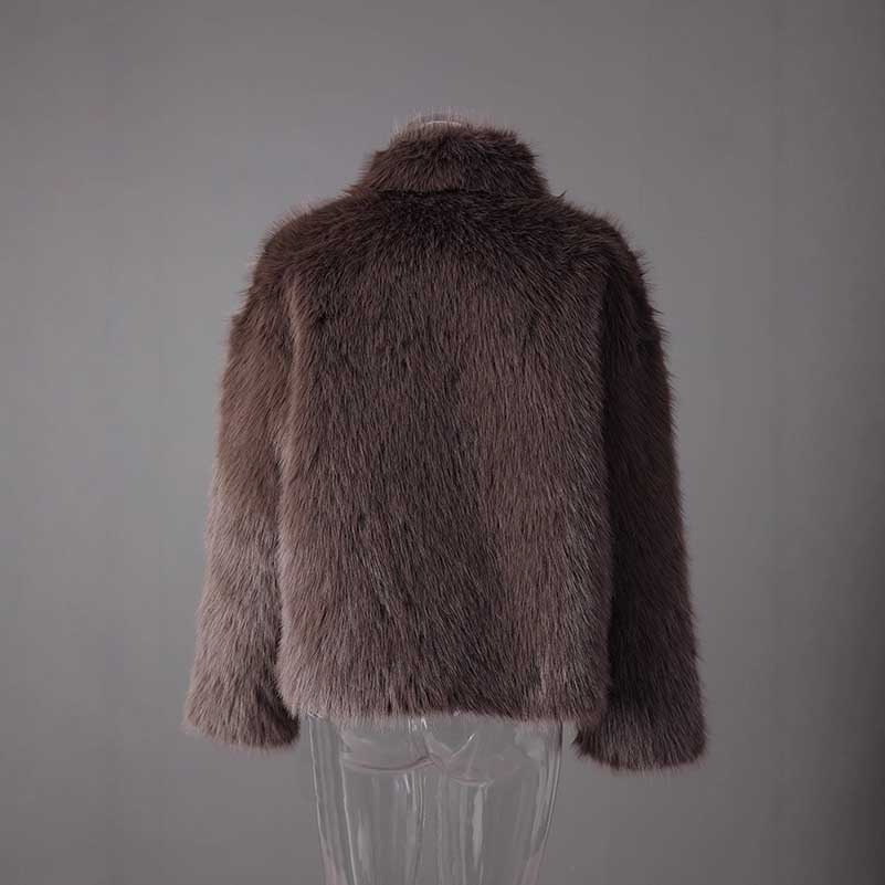 Brown faux fur short jacket with a plush texture, ideal for stylish winter layering
